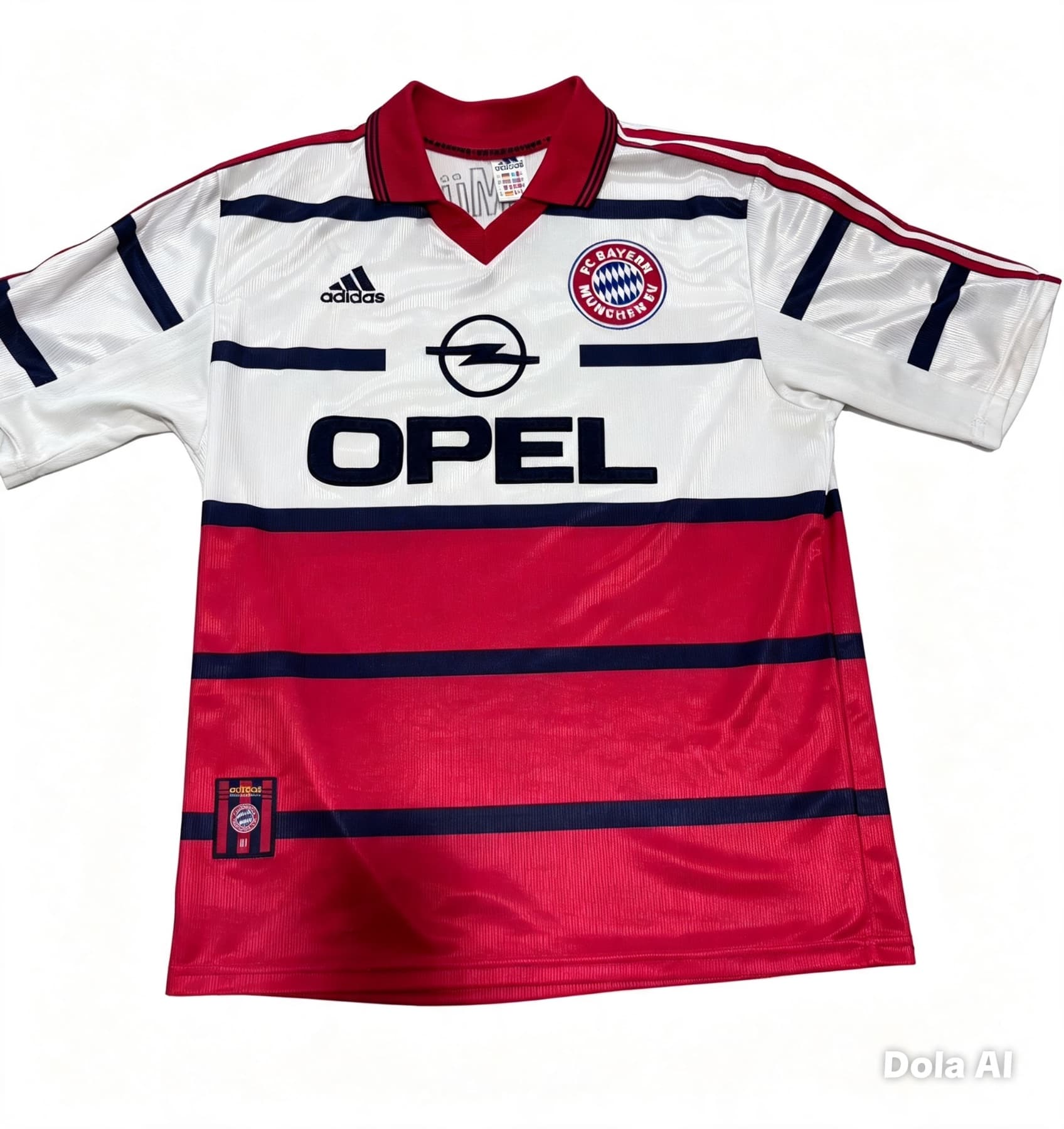 Front of a vintage 1998/2000 Bayern Munich away football shirt by Adidas. Features a white and red colorblock design, thin navy stripes, and a bold black Opel sponsor logo.